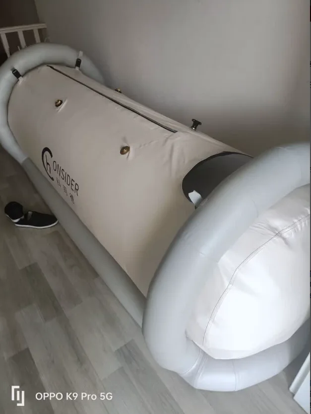 Soft lying chamber with inflated safety frame